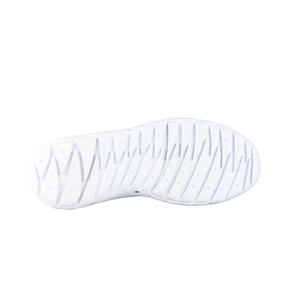 Bottom view of Crosskix Tetra Agua water shoe displaying white flexible sole with drainage channels and tread pattern for water activities