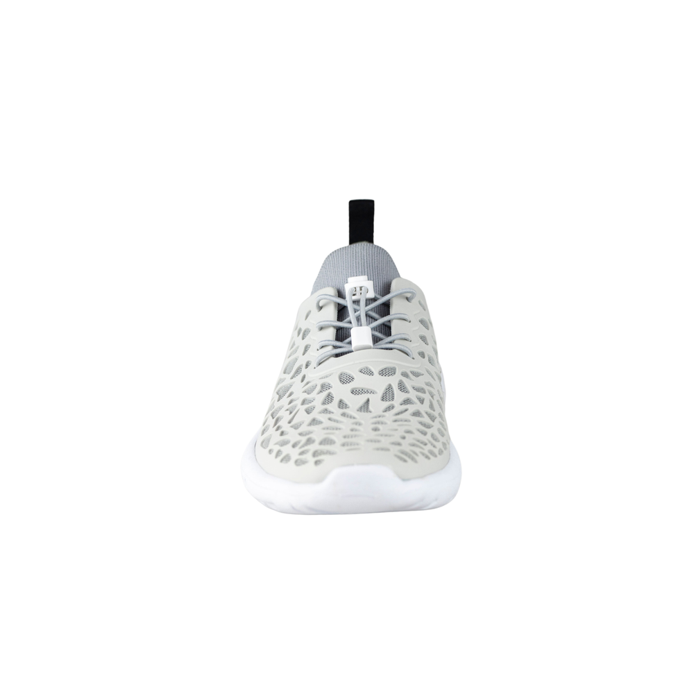 Front view of white Crosskix Tetra Stone water shoe displaying the rounded toe design with ventilation holes and black heel tab pull